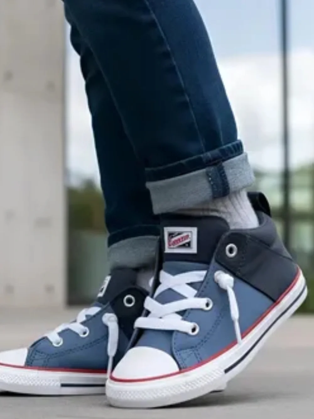 Converse Low-Top Sneakers in Blue, Black and White with Red Trim
